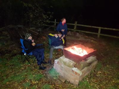 Scouts cooking on open fire